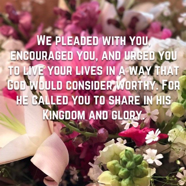 A bouquet of pink and white flowers, with the words of 1 Thessalonians 2:12
