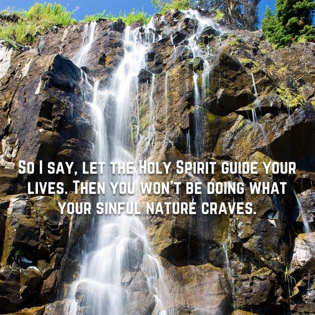 A waterfall pouring down dark rock, with the words of Galatians 5:16