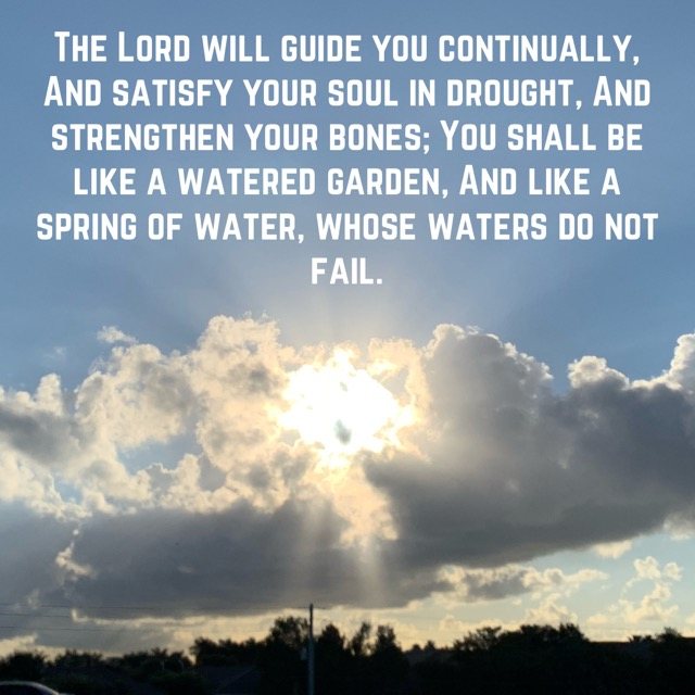 Sun shining through a bank of clouds, with the words of Isaiah 58:11