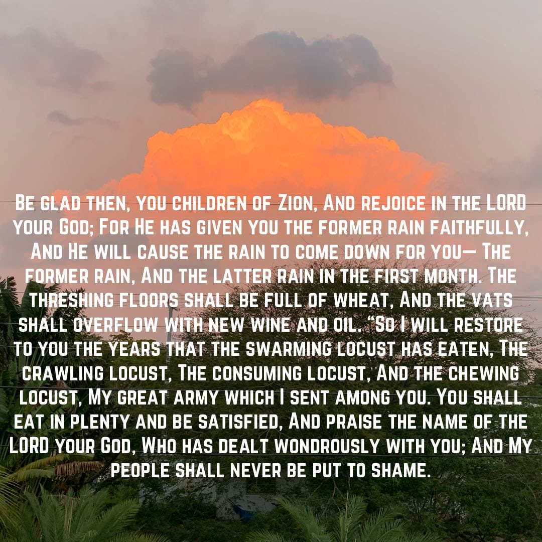 A glowing orange cloud above palm trees, with the words of Joel 2:23–26
