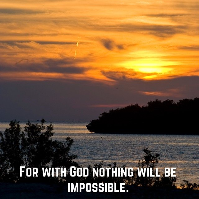 A golden sunset over a quiet bay, with the words of Luke 1:37