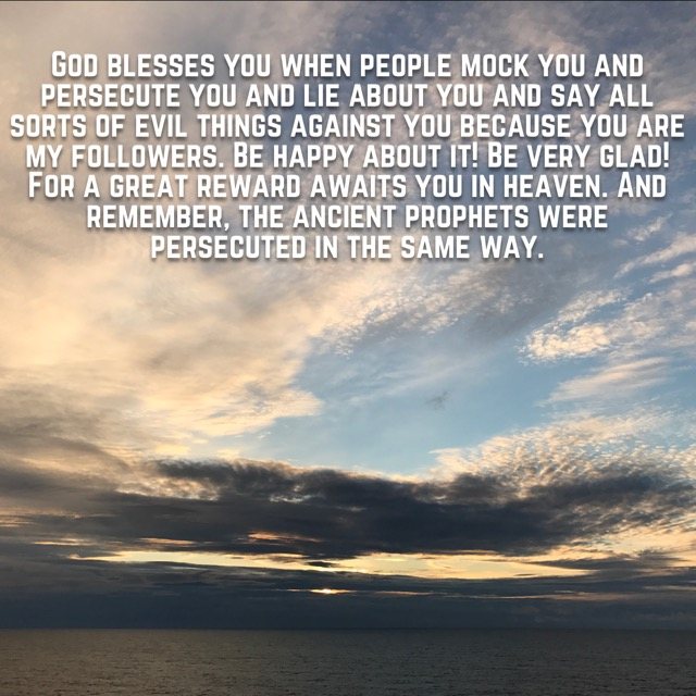 Evening clouds over the open sea, with the words of Matthew 5:11–12