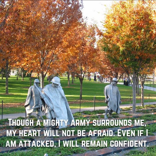 Soldier statues among autumn trees, with the words of Psalm 27:3
