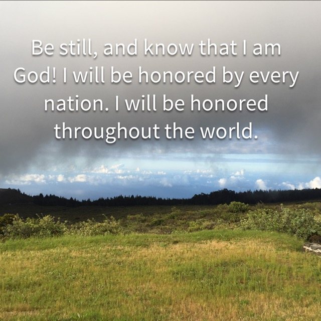 Clouds drifting over a grassy upland, with the words of Psalm 46:10