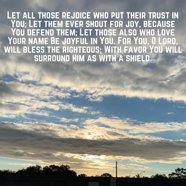 Layered clouds at sunset, with the words of Psalm 5:11–12