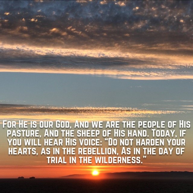 Sun setting over the sea beneath layered clouds, with the words of Psalm 95:7–8